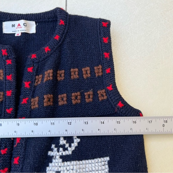 Navy Knit Vest with Reindeer Design
women’s size medium - Picture 6 of 7